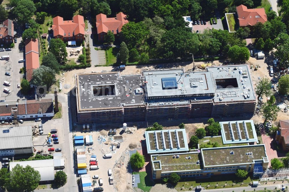 Berlin from the bird's eye view: Construction site for a new extension to the hospital grounds Arona Klinik of UKB BG Klinikum Unfallkrankenhaus Berlin gGmbH in the district Bezirk Marzahn-Hellersdorf in Berlin