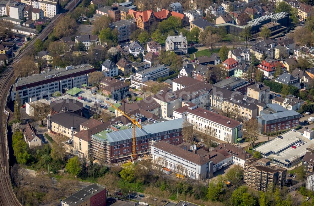 Bochum from the bird's eye view: Construction site for a new extension to the hospital grounds Augusta Kliniken Bochum Hattingen on Bergstrasse in Bochum in the state North Rhine-Westphalia, Germany