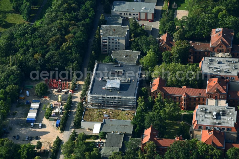 Aerial image Berlin - Construction site for a new extension to the hospital grounds Evangelisches Krankenhaus Koenigin Elisabeth Herzberge GmbH on Herzbergstrasse in the district Lichtenberg in Berlin, Germany