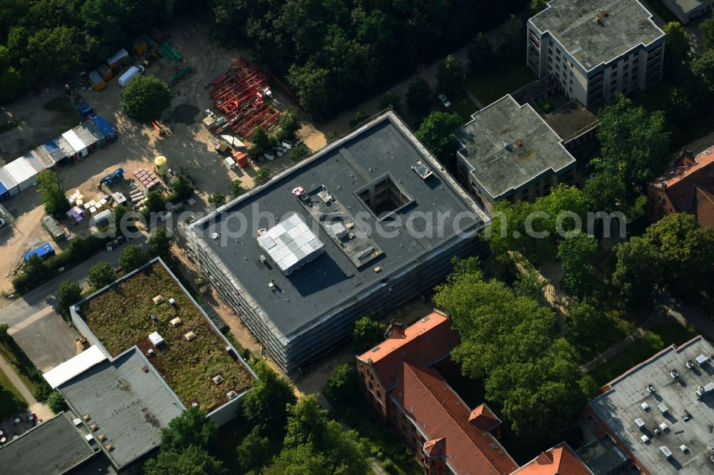 Berlin from above - Construction site for a new extension to the hospital grounds Evangelisches Krankenhaus Koenigin Elisabeth Herzberge GmbH on Herzbergstrasse in the district Lichtenberg in Berlin, Germany