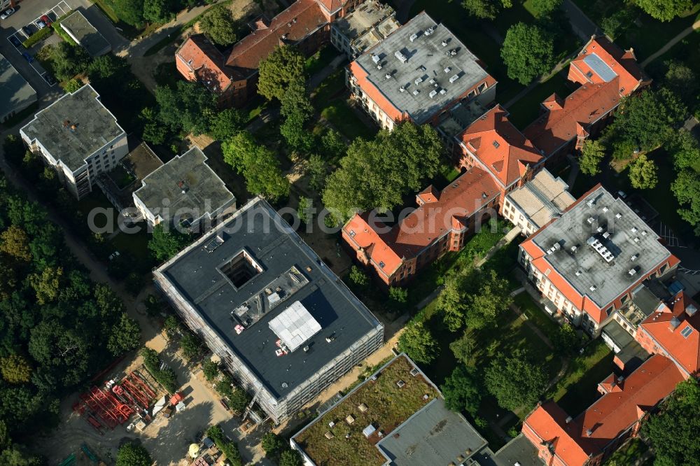 Aerial image Berlin - Construction site for a new extension to the hospital grounds Evangelisches Krankenhaus Koenigin Elisabeth Herzberge GmbH on Herzbergstrasse in the district Lichtenberg in Berlin, Germany