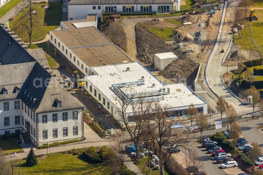 Aerial photograph Schmallenberg - Construction site for a new extension to the hospital grounds Fachkronkenhaus Kloster Grafschaft on Annostrasse in Schmallenberg in the state North Rhine-Westphalia, Germany