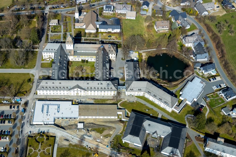 Schmallenberg from the bird's eye view: Construction site for a new extension to the hospital grounds Fachkronkenhaus Kloster Grafschaft on Annostrasse in Schmallenberg in the state North Rhine-Westphalia, Germany