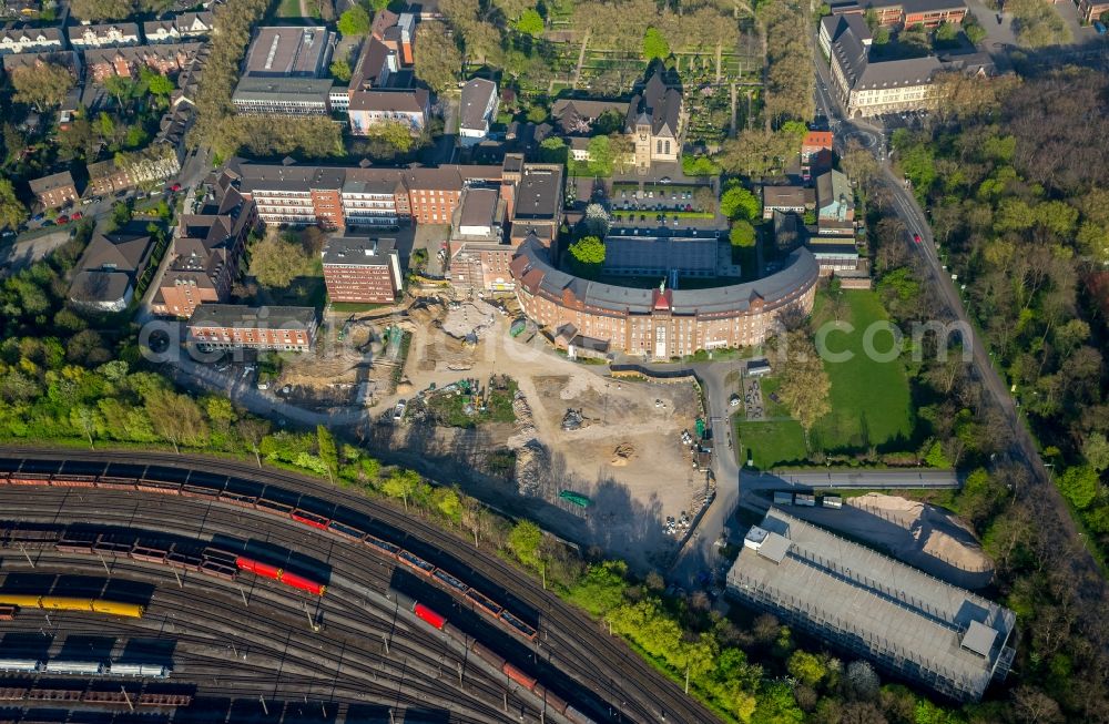 Duisburg from above - Construction site for a new extension to the hospital grounds Helios St. Johonnes Klinik Duisburg An of Abtei in Duisburg in the state North Rhine-Westphalia, Germany