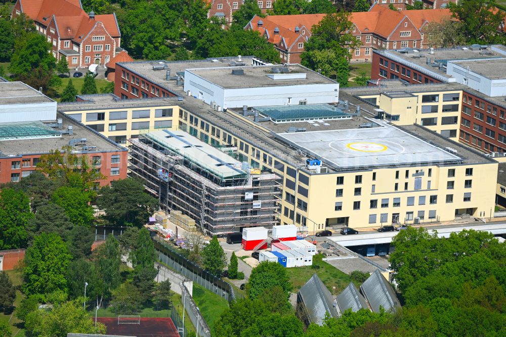 Berlin from the bird's eye view: Construction site for a new extension to the hospital grounds Helios Klinikum Berlin-Buch on street Schwanebecker Chaussee in the district Buch in Berlin, Germany