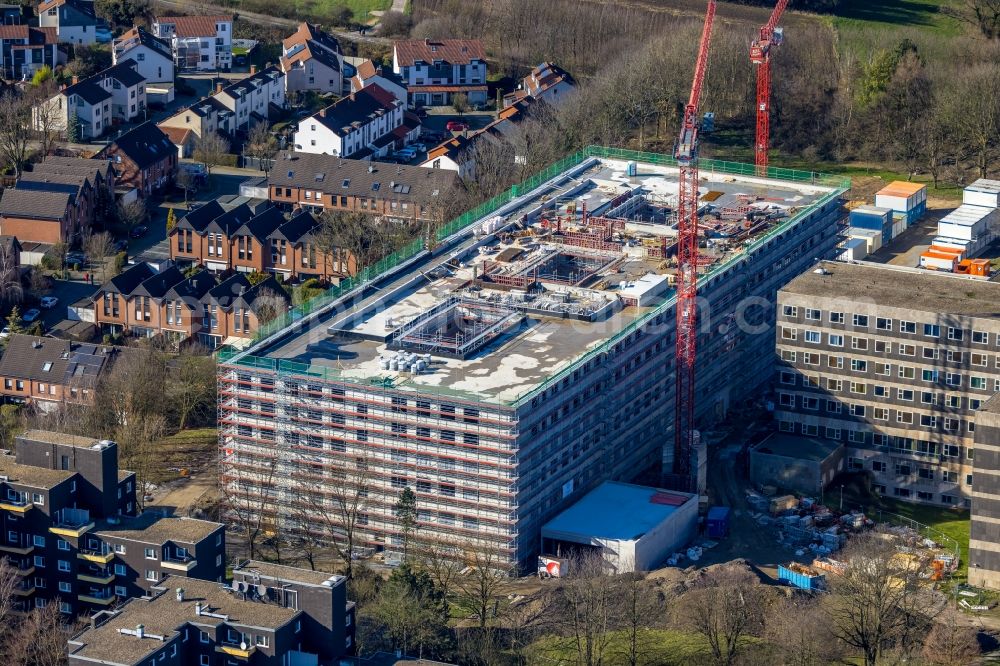 Velbert from above - Construction site for a new extension to the hospital grounds Helios Klinikum Niederberg on Robert-Koch-Strasse in Velbert in the state North Rhine-Westphalia, Germany