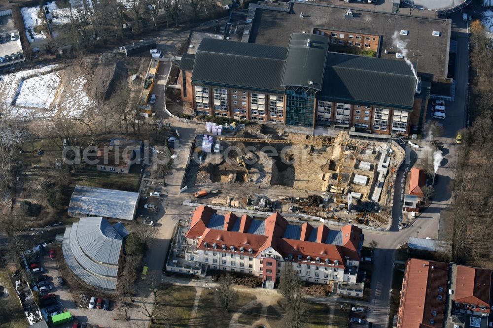 Bernau from the bird's eye view: Construction site for a new extension to the hospital grounds Herzzentrum Brandenburg Ladeburger Strasse in Bernau in the state Brandenburg