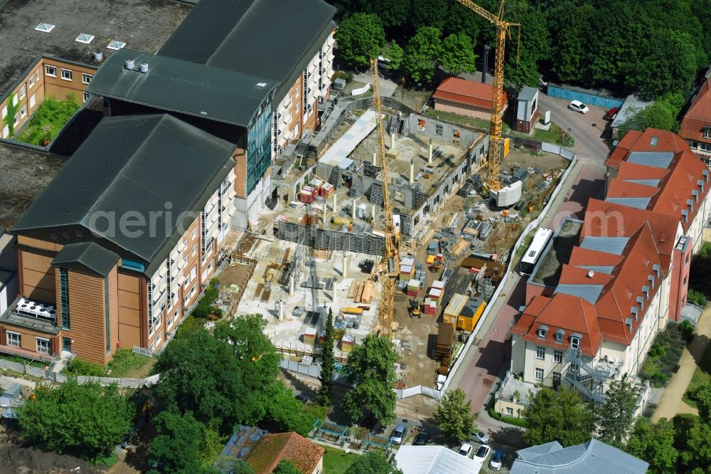 Aerial photograph Bernau - Construction site for a new extension to the hospital grounds Herzzentrum Brandenburg Ladeburger Strasse in Bernau in the state Brandenburg