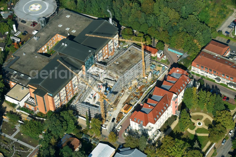 Aerial photograph Bernau - Construction site for a new extension to the hospital grounds Herzzentrum Brandenburg Ladeburger Strasse in Bernau in the state Brandenburg