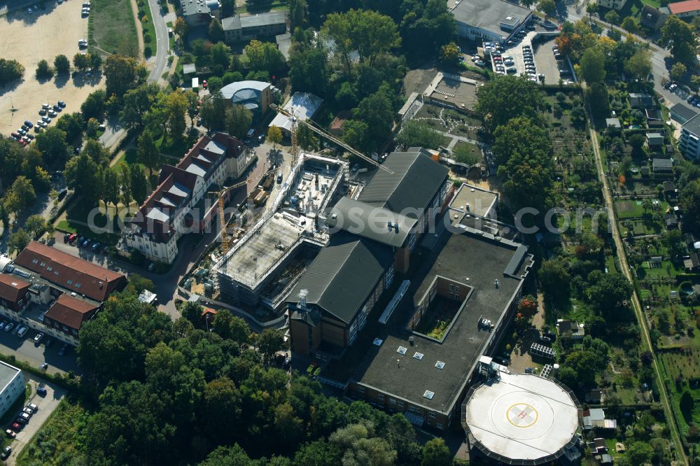 Aerial photograph Bernau - Construction site for a new extension to the hospital grounds Herzzentrum Brandenburg Ladeburger Strasse in Bernau in the state Brandenburg