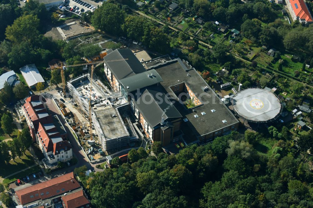 Bernau from the bird's eye view: Construction site for a new extension to the hospital grounds Herzzentrum Brandenburg Ladeburger Strasse in Bernau in the state Brandenburg