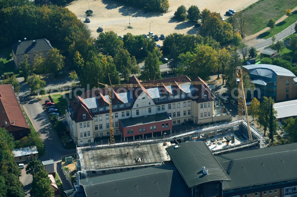 Aerial photograph Bernau - Construction site for a new extension to the hospital grounds Herzzentrum Brandenburg Ladeburger Strasse in Bernau in the state Brandenburg