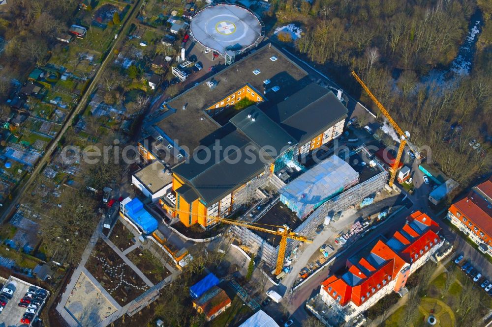 Bernau from the bird's eye view: Construction site for a new extension to the hospital grounds Herzzentrum Brandenburg Ladeburger Strasse in Bernau in the state Brandenburg