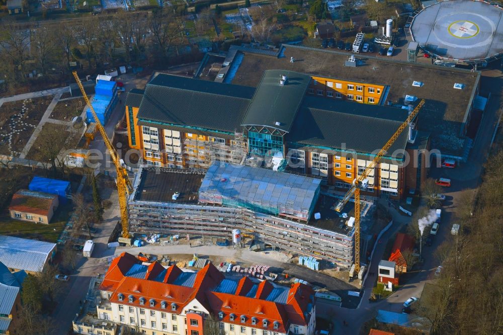 Bernau from the bird's eye view: Construction site for a new extension to the hospital grounds Herzzentrum Brandenburg Ladeburger Strasse in Bernau in the state Brandenburg