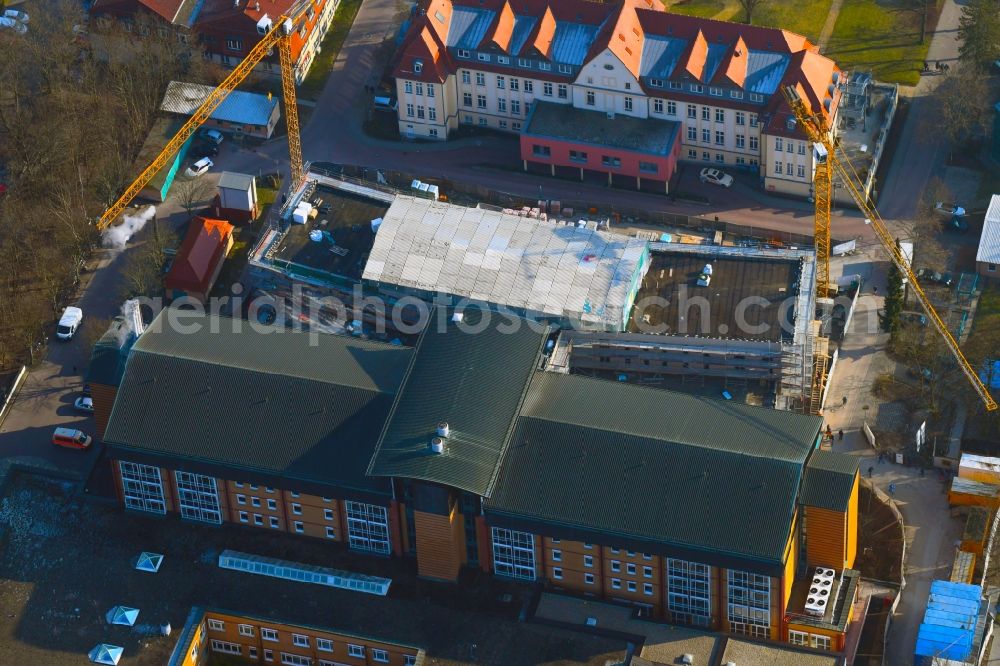 Bernau from the bird's eye view: Construction site for a new extension to the hospital grounds Herzzentrum Brandenburg Ladeburger Strasse in Bernau in the state Brandenburg