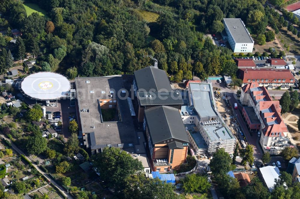 Bernau from the bird's eye view: Construction site for a new extension to the hospital grounds Herzzentrum Brandenburg Ladeburger Strasse in Bernau in the state Brandenburg