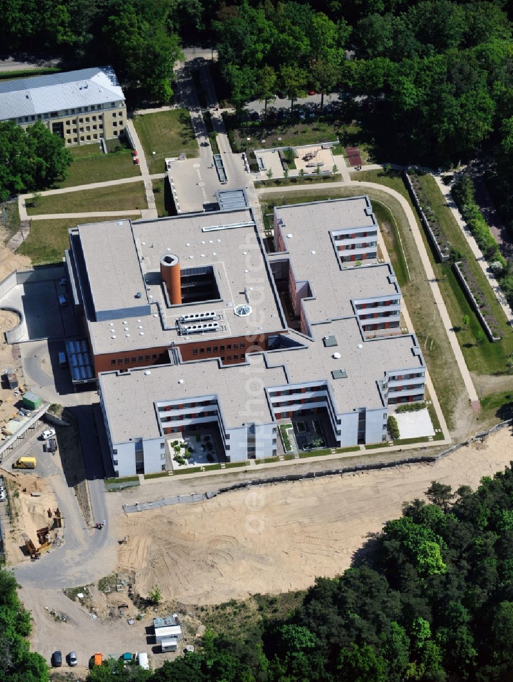 Rüdersdorf from above - Construction site for a new extension to the hospital grounds Immanuel Klinik Ruedersdorf in Ruedersdorf in the state Brandenburg, Germany