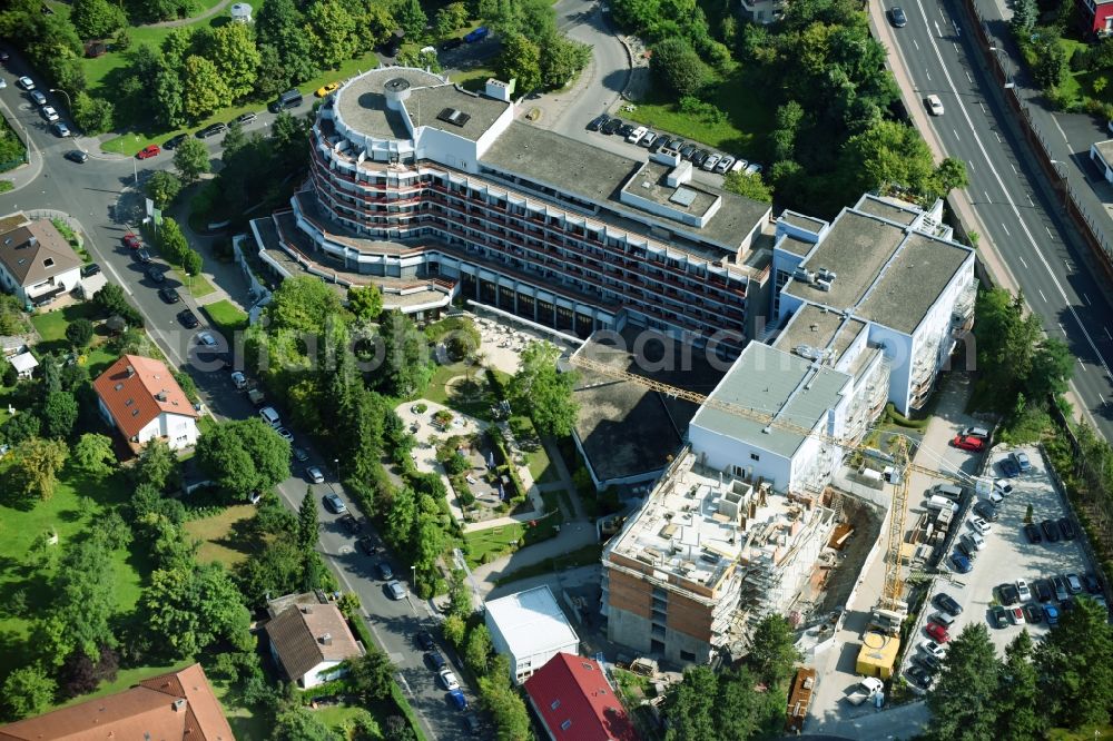 Bad Kissingen from above - Construction site for a new extension to the hospital grounds Klinik Bavaria GmbH & Co. KG on Von-der-Tann-Strasse in Bad Kissingen in the state Bavaria, Germany