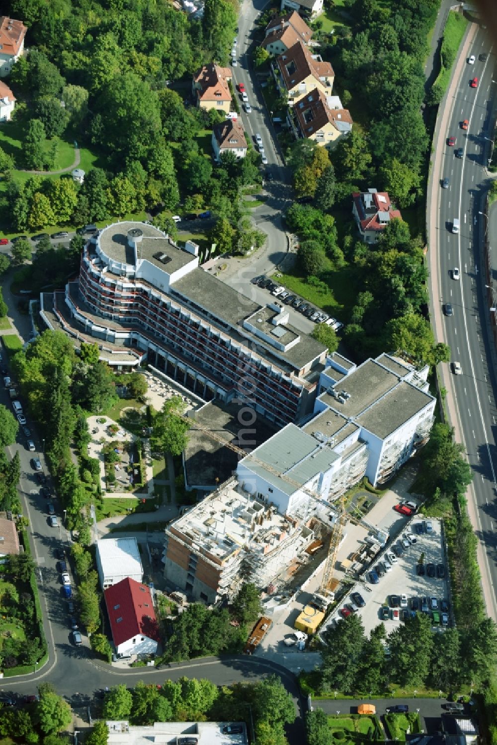 Bad Kissingen from the bird's eye view: Construction site for a new extension to the hospital grounds Klinik Bavaria GmbH & Co. KG on Von-der-Tann-Strasse in Bad Kissingen in the state Bavaria, Germany