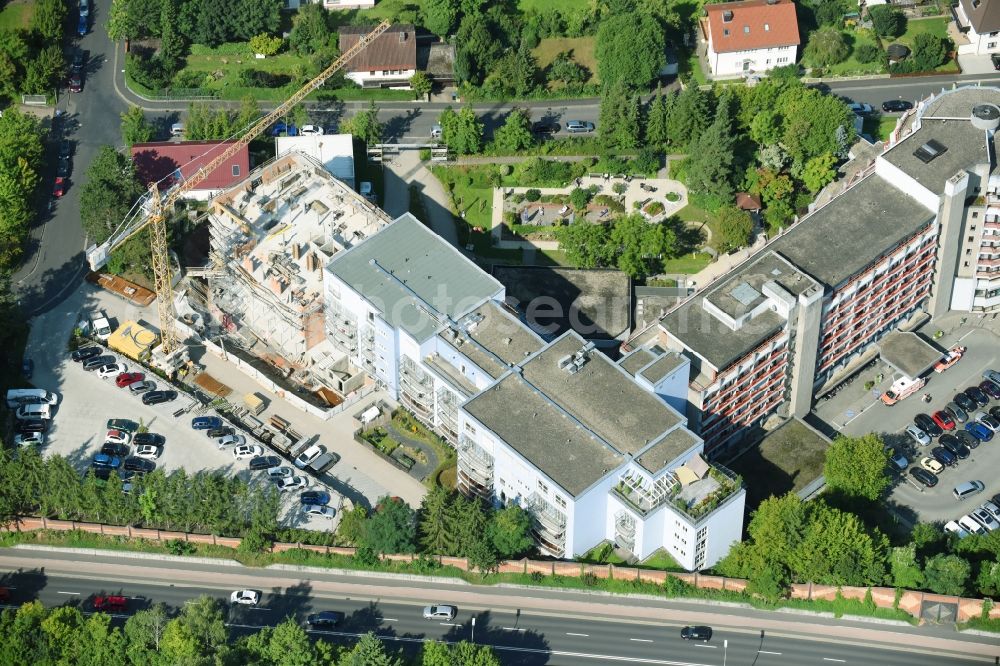 Bad Kissingen from above - Construction site for a new extension to the hospital grounds Klinik Bavaria GmbH & Co. KG on Von-der-Tann-Strasse in Bad Kissingen in the state Bavaria, Germany