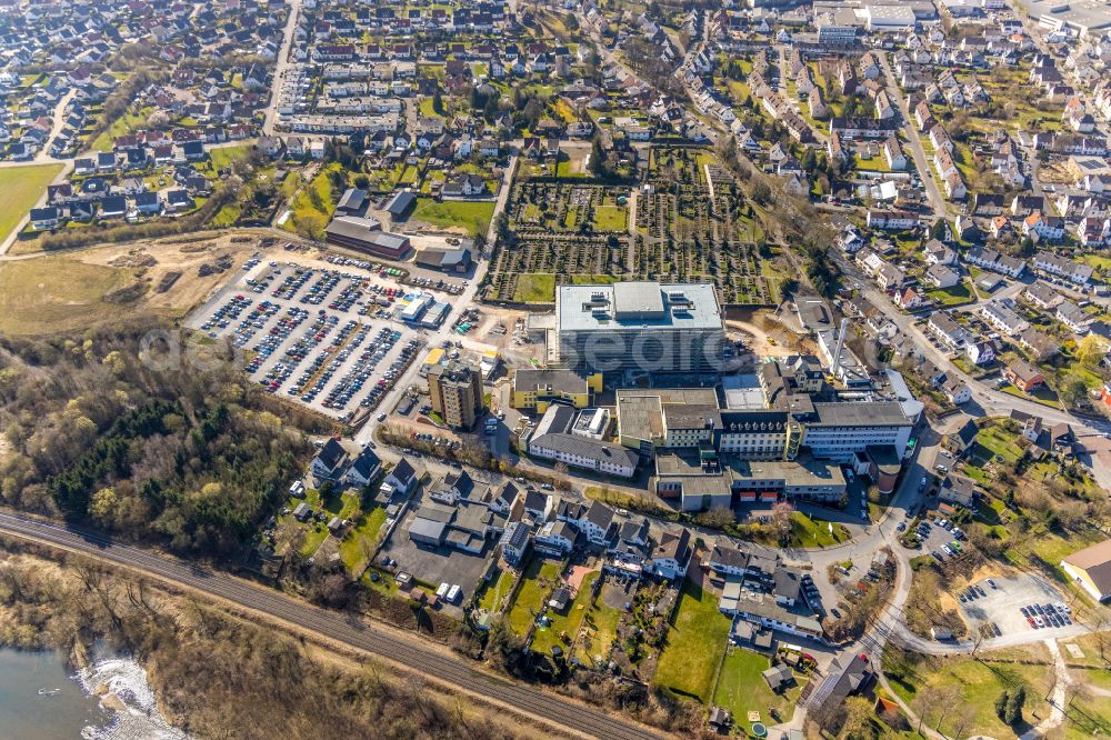 Arnsberg from above - Construction site for a new extension to the hospital grounds Klinikum Hochsauerland on street Stolte Ley in Arnsberg at Sauerland in the state North Rhine-Westphalia, Germany