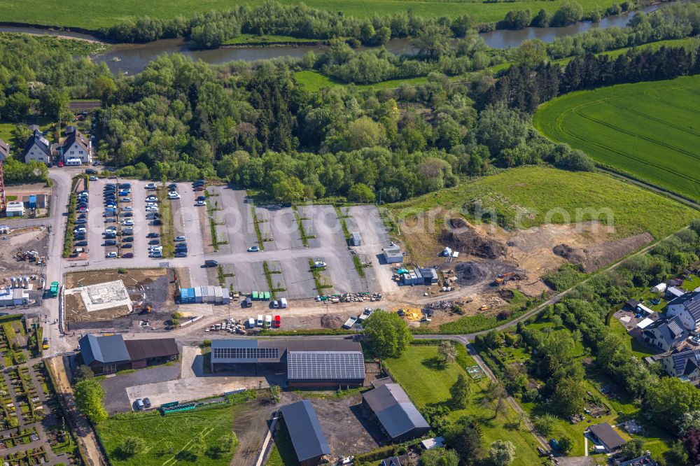 Aerial photograph Arnsberg - Construction site for a new extension to the hospital grounds Klinikum Hochsauerland - Karolinen-Hospital in the district Huesten in Arnsberg at Sauerland in the state North Rhine-Westphalia, Germany