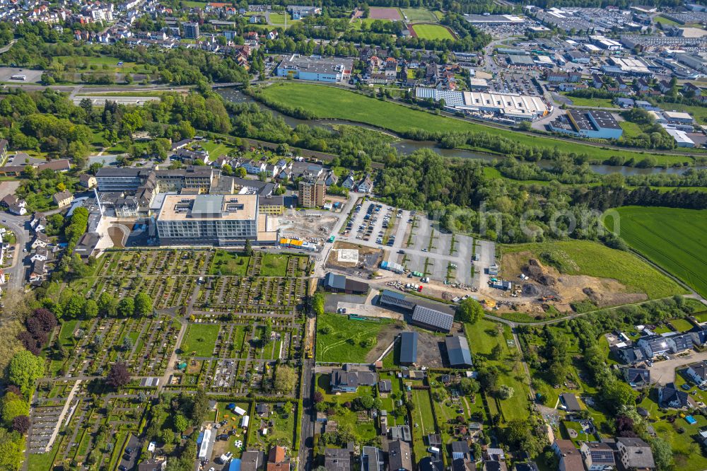 Aerial image Arnsberg - Construction site for a new extension to the hospital grounds Klinikum Hochsauerland - Karolinen-Hospital in the district Huesten in Arnsberg at Sauerland in the state North Rhine-Westphalia, Germany