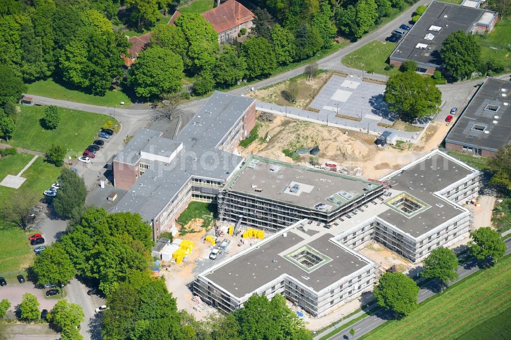 Bedburg-Hau from above - Construction site for a new extension to the hospital grounds LVR-Klinik Bedburg-Hau on Johann-van-Aken-Ring - Gruener Winkel in Bedburg-Hau in the state North Rhine-Westphalia, Germany