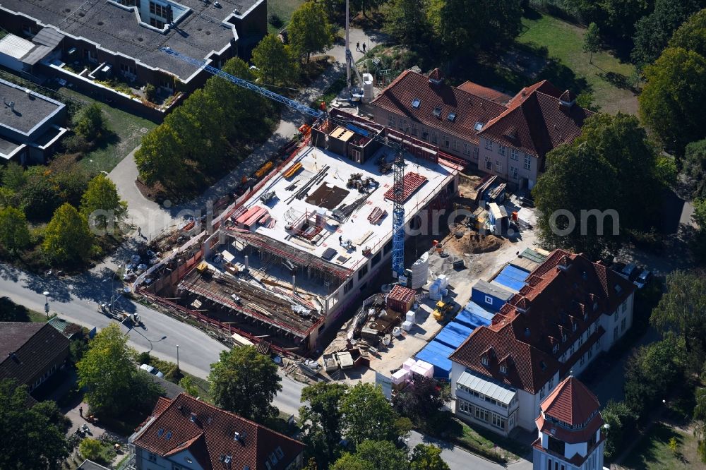 Lübeck from the bird's eye view: Construction site for a new extension to the hospital grounds UKSH Universitaetsklinikum Schleswig-Holstein in the district St. Juergen in Luebeck in the state Schleswig-Holstein, Germany