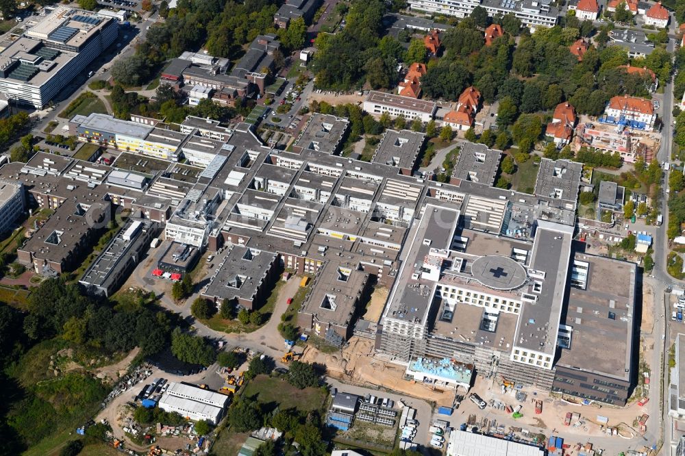 Lübeck from the bird's eye view: Construction site for a new extension to the hospital grounds UKSH Universitaetsklinikum Schleswig-Holstein in the district St. Juergen in Luebeck in the state Schleswig-Holstein, Germany