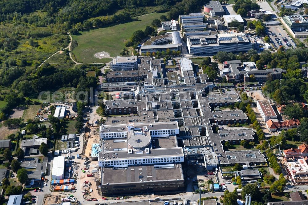 Lübeck from the bird's eye view: Construction site for a new extension to the hospital grounds UKSH Universitaetsklinikum Schleswig-Holstein in the district St. Juergen in Luebeck in the state Schleswig-Holstein, Germany