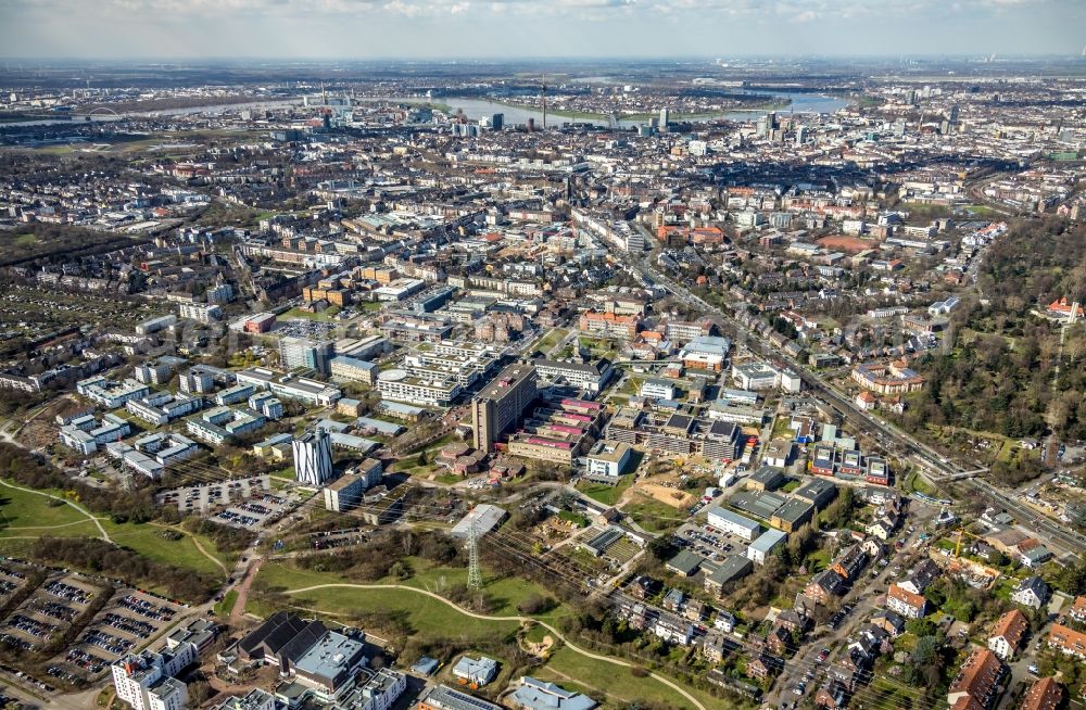 Düsseldorf from the bird's eye view: Construction site for a new extension to the hospital grounds Universitaetsklinikum Duesseldorf on Moorenstrasse in Duesseldorf in the state North Rhine-Westphalia, Germany