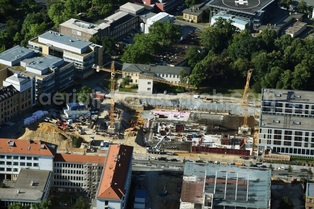 Leipzig from the bird's eye view: Construction site for a new extension to the hospital grounds Universitaetsklinikum Leipzig on Liebigstrasse in Leipzig in the state Saxony