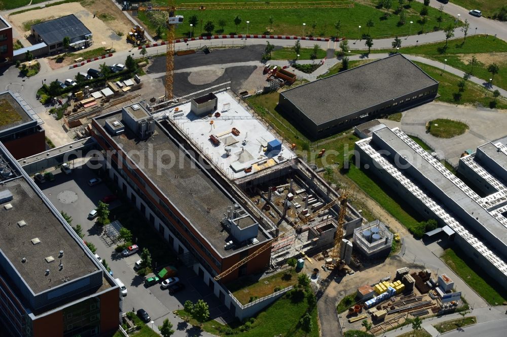 Regensburg from the bird's eye view: Construction site for a new extension to the hospital grounds Universitaetsklinikum Regensburg on Franz-Josef-Strauss-Allee in Regensburg in the state Bavaria, Germany