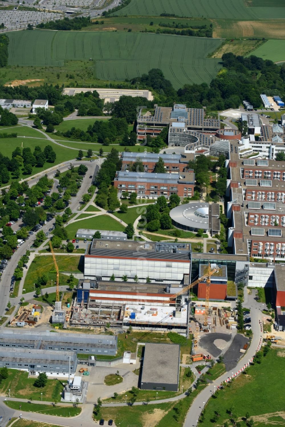 Aerial photograph Regensburg - Construction site for a new extension to the hospital grounds Universitaetsklinikum Regensburg on Franz-Josef-Strauss-Allee in Regensburg in the state Bavaria, Germany