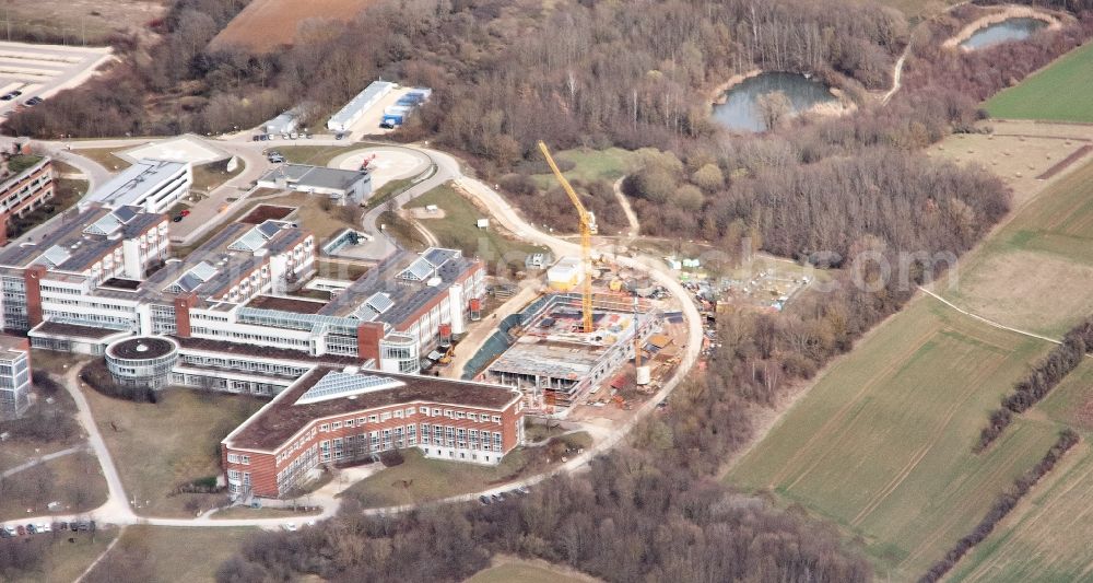 Regensburg from the bird's eye view: Construction site for a new extension to the hospital grounds Universitaetsklinikum Regensburg on Franz-Josef-Strauss-Allee in Regensburg in the state Bavaria, Germany