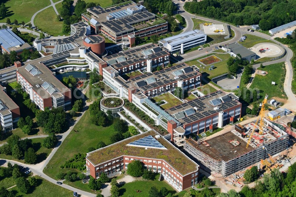 Regensburg from the bird's eye view: Construction site for a new extension to the hospital grounds Universitaetsklinikum Regensburg on Franz-Josef-Strauss-Allee in Regensburg in the state Bavaria, Germany