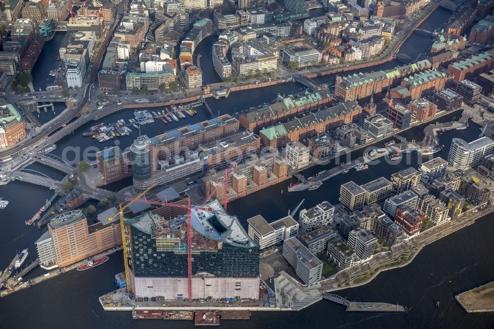 Aerial photograph Hamburg - Construction site of the Elbe Philharmonic Hall on the banks of the Elbe in the warehouse district of Hamburg