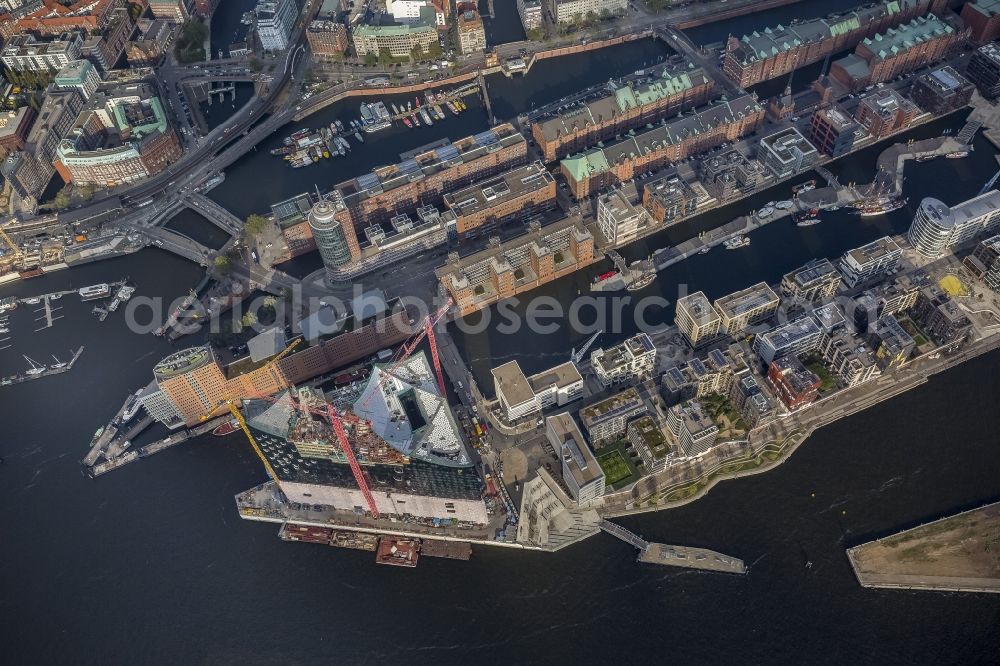 Hamburg from above - Construction site of the Elbe Philharmonic Hall on the banks of the Elbe in the warehouse district of Hamburg