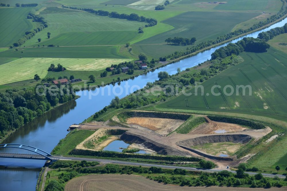 Aerial image Burg (bei Magdeburg) - Construction site on Elbe-Havel-Kanal in the North of Burg (bei Magdeburg) in the state of Saxony-Anhalt. The site of a new road and bridge is located in the North of the county capital