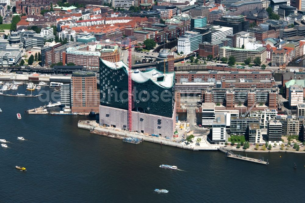 Hamburg from the bird's eye view: The Elbe Philharmonic Hall on the river bank of the Elbe in Hamburg. The building in the district HafenCity is still in process of construction