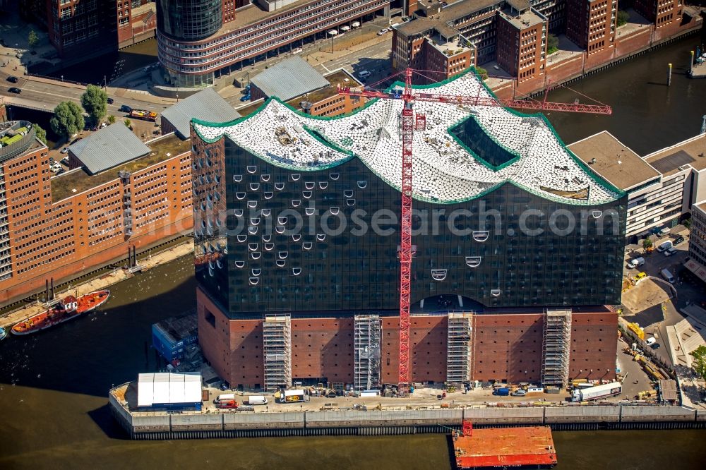 Aerial image Hamburg - The Elbe Philharmonic Hall on the river bank of the Elbe in Hamburg. The building in the district HafenCity is still in process of construction