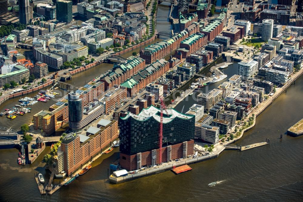 Hamburg from the bird's eye view: The Elbe Philharmonic Hall on the river bank of the Elbe in Hamburg. The building in the district HafenCity is still in process of construction