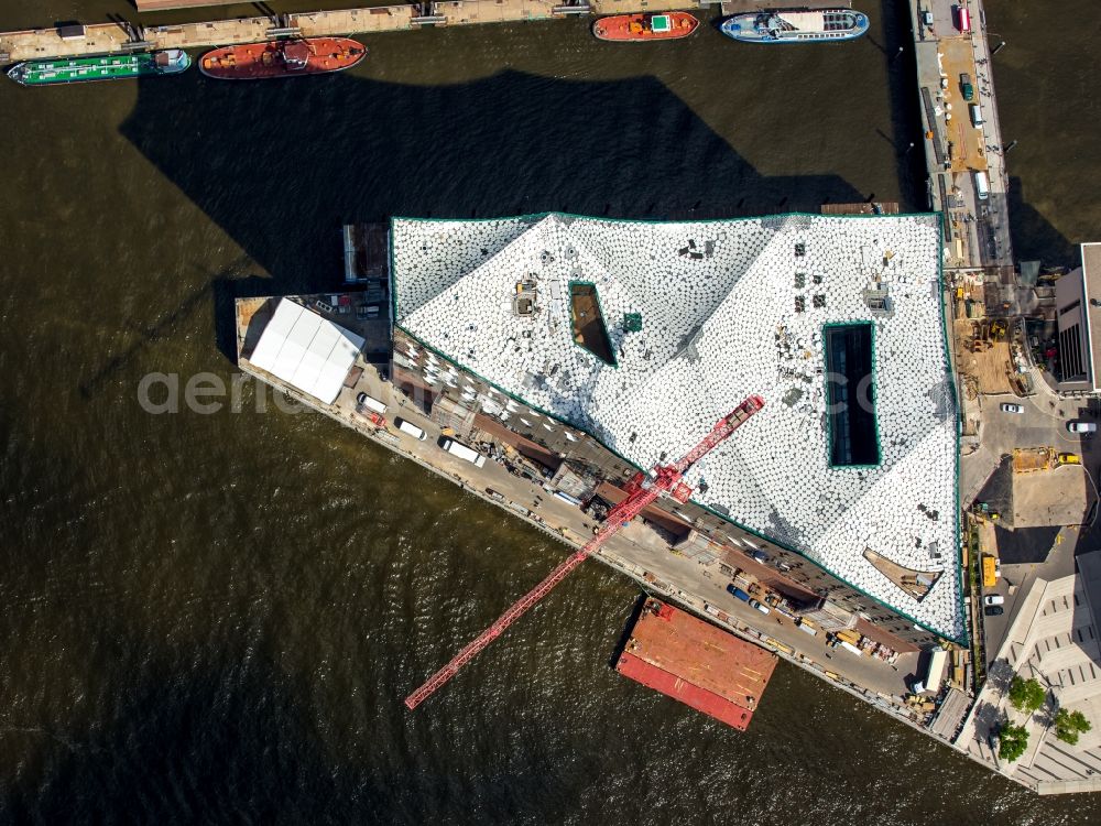 Aerial image Hamburg - The Elbe Philharmonic Hall on the river bank of the Elbe in Hamburg. The building in the district HafenCity is still in process of construction