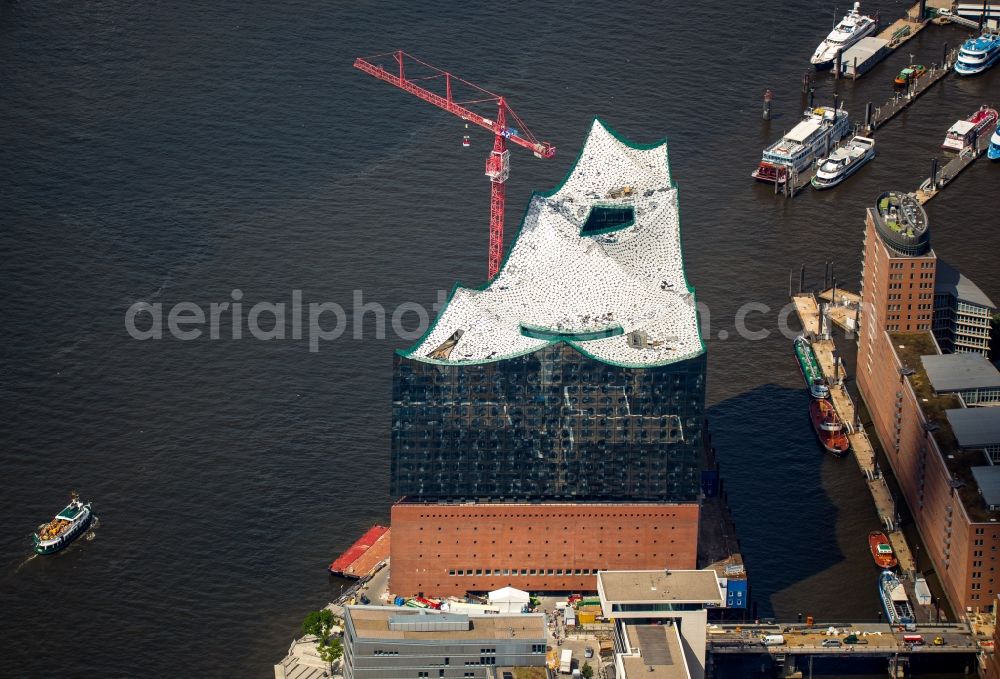 Aerial photograph Hamburg - The Elbe Philharmonic Hall on the river bank of the Elbe in Hamburg. The building in the district HafenCity is still in process of construction