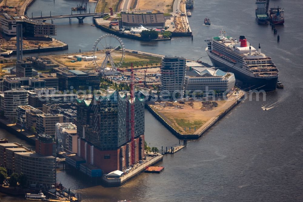 Hamburg from the bird's eye view: The Elbe Philharmonic Hall on the river bank of the Elbe in Hamburg. The building in the district HafenCity is still in process of construction