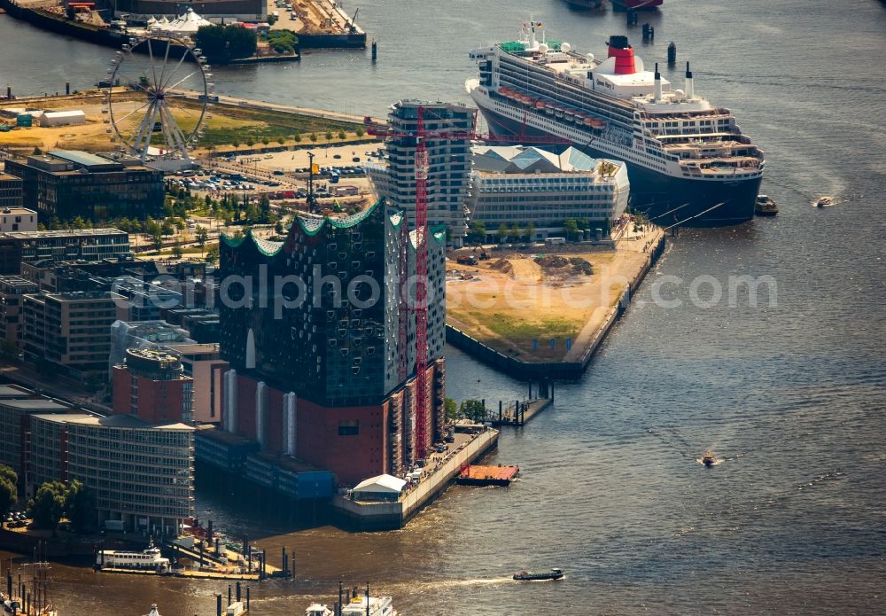 Hamburg from the bird's eye view: The Elbe Philharmonic Hall on the river bank of the Elbe in Hamburg. The building in the district HafenCity is still in process of construction