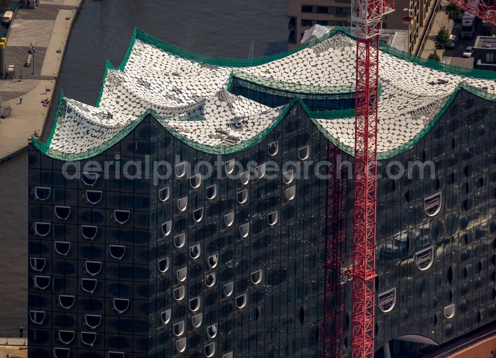 Aerial image Hamburg - The Elbe Philharmonic Hall on the river bank of the Elbe in Hamburg. The building in the district HafenCity is still in process of construction