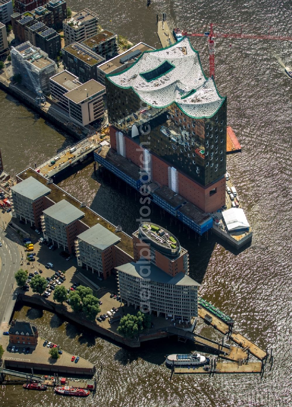 Hamburg from the bird's eye view: The Elbe Philharmonic Hall on the river bank of the Elbe in Hamburg. The building in the district HafenCity is still in process of construction