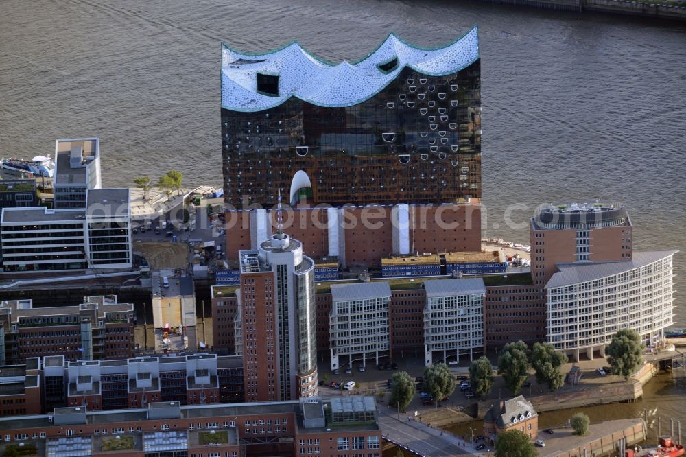 Aerial image Hamburg - The Elbe Philharmonic Hall on the river bank of the Elbe in Hamburg. The building in the district HafenCity is still in process of construction